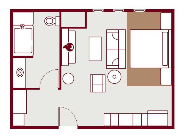 A small apartment floor plan: bedroom with bed, wardrobe; bathroom with tub; living area with sofa, chairs, table; kitchen/utility area with counters; central doorway and entry.