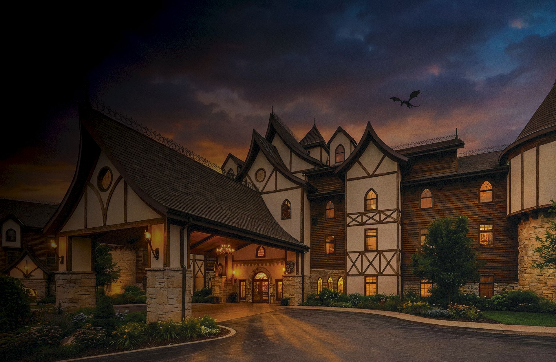 A large Tudor-style hotel with timber-framed walls, stone accents, and a curved driveway at dusk, warm lights glowing from windows under a dramatic sky.