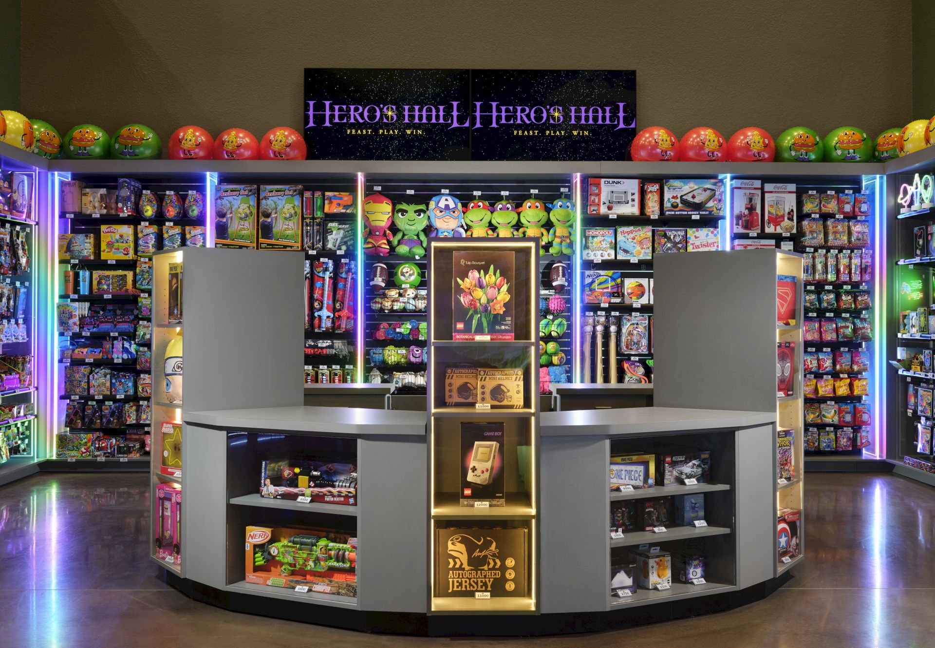 A brightly lit game store or arcade with colorful shelves, arcade prizes, and a central circular checkout area,  led by a neon sign.